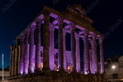 Temple of diana in merida bathing in purple light at night