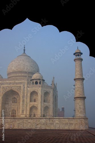 View of Taj Mahal in early morning fog seen through jawab, Agra, Uttar Pradesh, India