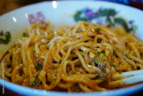 Close-up of Delicious Dan Dan Noodles in a Bowl
