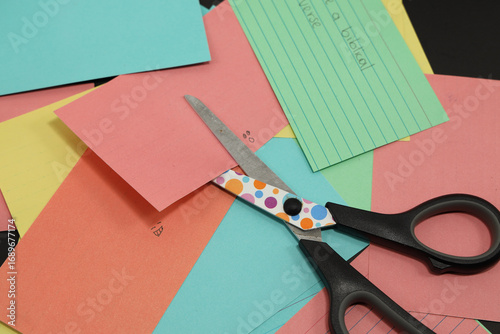 school scissors cutting colored paper