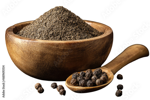 Ground black pepper in a wooden bowl, with whole peppercorns on a wooden spoon