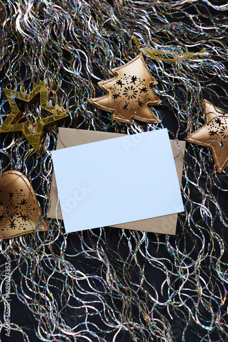 Christmas card design made of fir branches, tinsel and Christmas balls