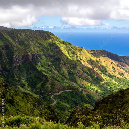 Lush mountain range with winding road