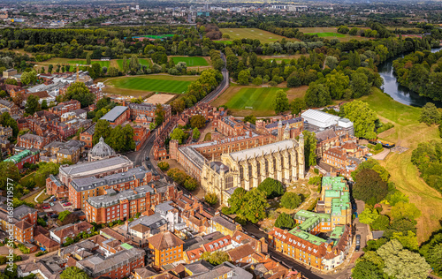 Aerial view of Eton College and surrounding historic town buildings with green fields