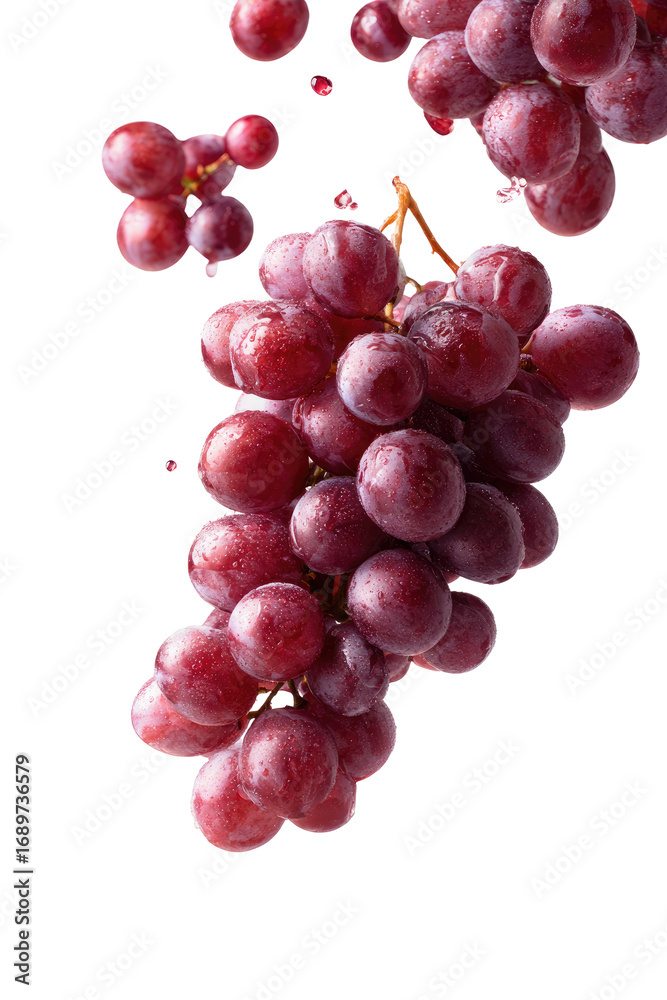 Fototapeta premium Red grapes in mid-air, bunching together