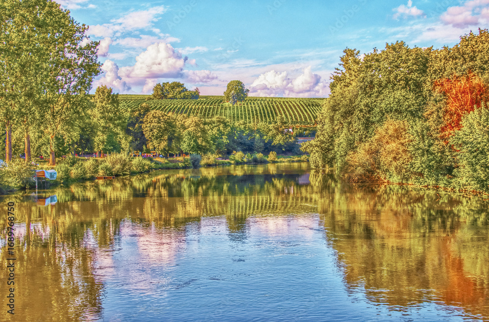 Fototapeta premium Serene Autumn River with Hills and Sky