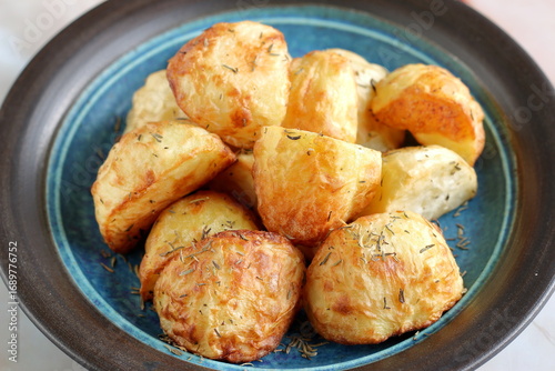 Roast Potatoes cooked in an Air Fryer with dried thyme