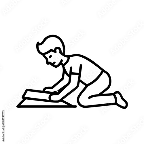 Young man laying laminate flooring, focused mood

