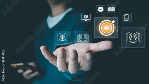 A person uses a smartphone to access a virtual interface with icons for education, learning, and achieving goals, representing the concept of online courses and skill development for future success.