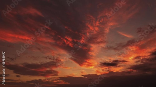 Time-Lapse Dramatic Evening Red Orange Clouds On Dark Blue Sky 