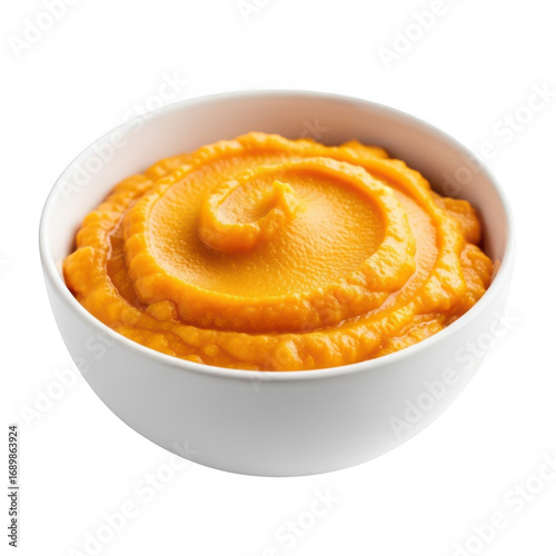 A white bowl filled with smooth, vibrant orange pumpkin puree, isolated on transparent background