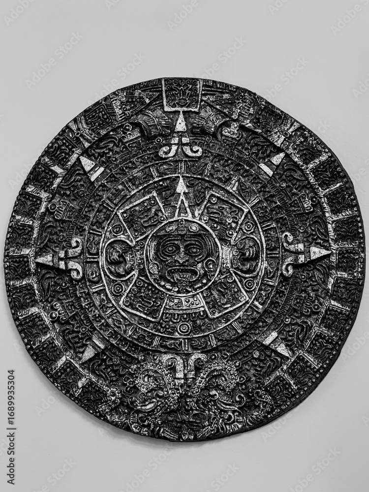 Black and white photo of an ancient Aztec calendar stone, richly ...