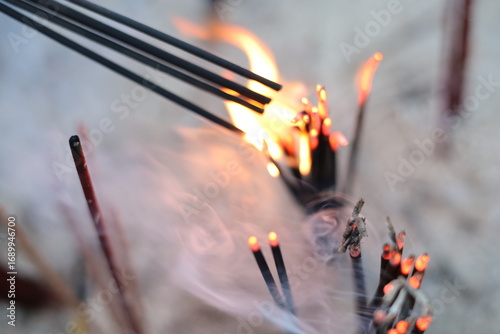 burning incense in a buddhist temple