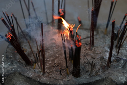 burning incense in a buddhist temple