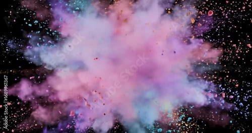 Colorful powder explosion against black background