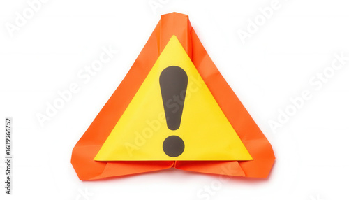 Warning sign in orange and yellow origami style on white background  