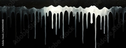 abstract black and white painting with vertical dripping paint streaks creating a gradient effect from white to black expressing fluidity and contrast