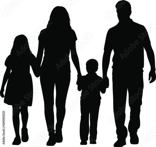 Silhouetted family walking together parents children