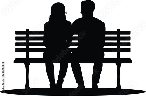 Couple sitting on park bench silhouette