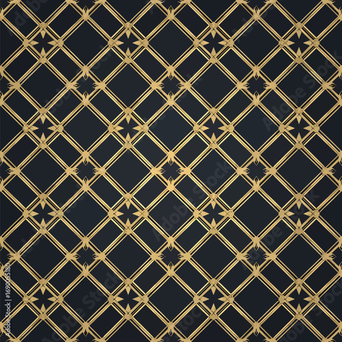 Ornate gold trellis pattern with floral accents on a dark backdrop design, patern seamless, Stock royalty.