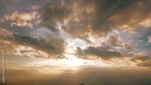 Sunset with golden light and dramatic clouds