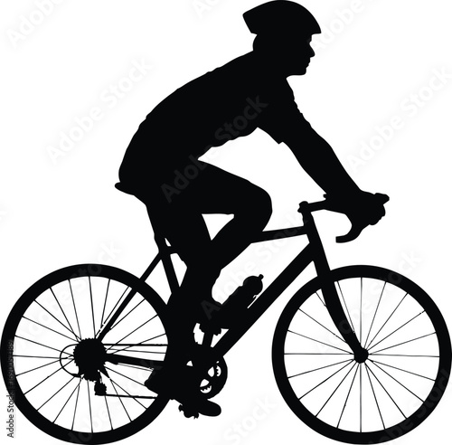 Silhouette of a man riding a bicycle on a bike ride