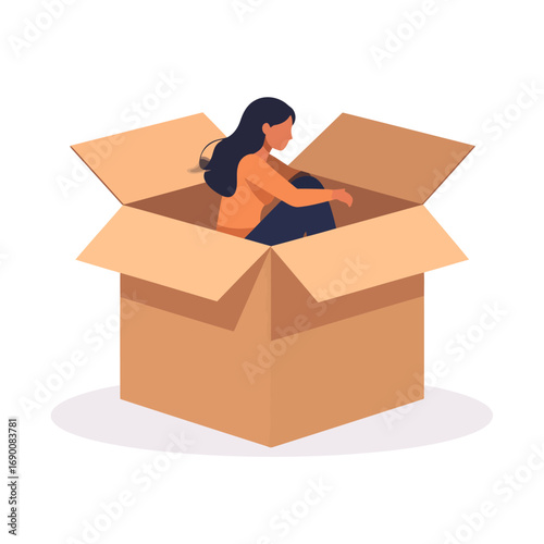 Woman sitting curled up inside a large open cardboard box.