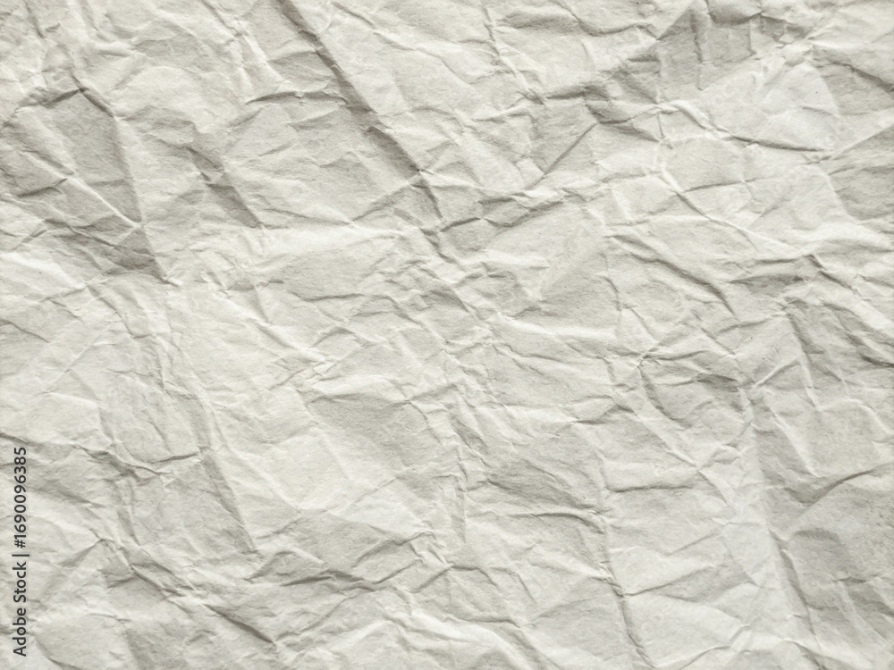 Fototapeta premium White Crumpled Paper Texture with Folds and Wrinkles