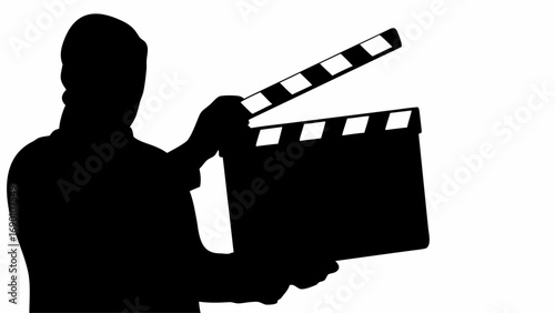 Silhouette of person holding a clapperboard with black and white stripes in a bright white background