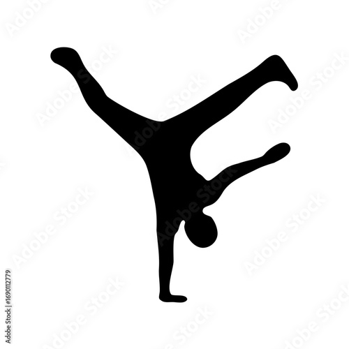 Silhouette of a breakdancer doing a one hand handstand with split legs