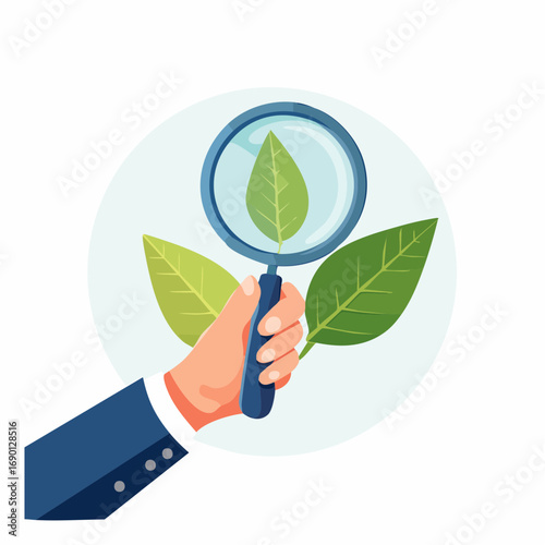 Hand Holding Magnifying Glass Over Leaves