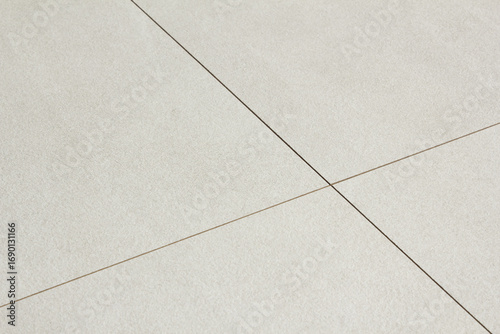 A close-up of a tiled hardwood floor.