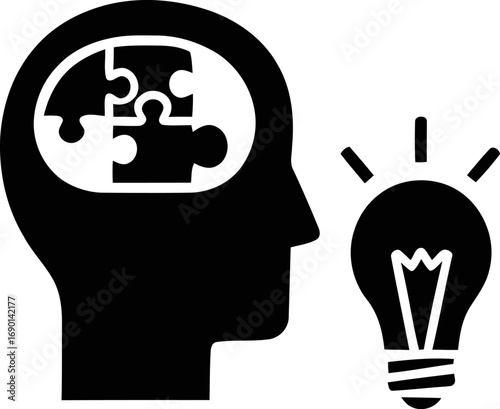 Human head silhouette with puzzle pieces and light bulb