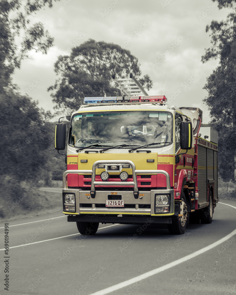 Obraz premium Rural Fire Truck on Country Road Queensland Australia