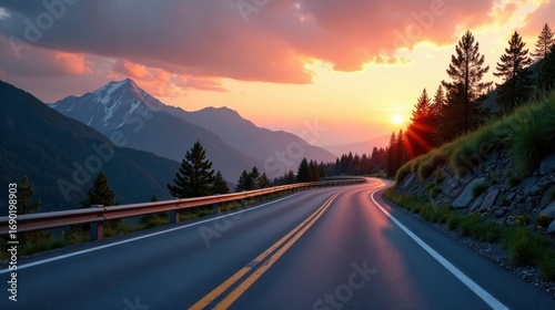 Serene Sunset Vista A Winding Asphalt Road Curves Through Majestic Mountains Bathed in the Golden Hues of Twilight