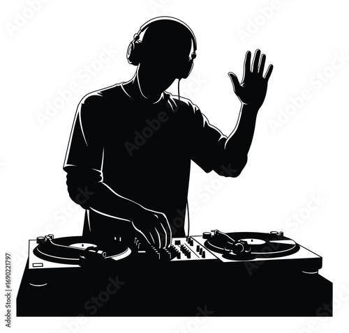 A DJ wearing headphones mixes music and waves to the crowd