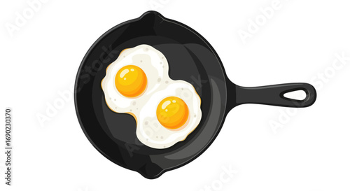 Foto Two Fried Eggs in a Black Cast Iron Skillet.