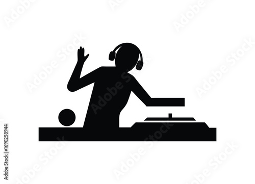 Silhouette of a dj performing with headphones and turntables a lively party scene