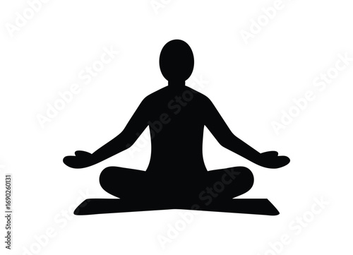 Silhouette of a person meditating in a lotus pose with open hands