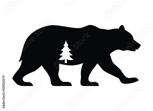 Majestic bear silhouette with evergreen tree inside natural wilderness scene