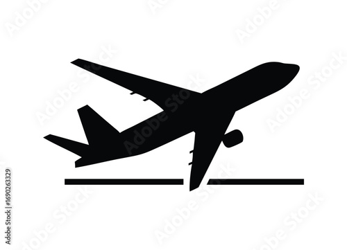 Silhouette of a modern jet airplane taking off against a plain surface