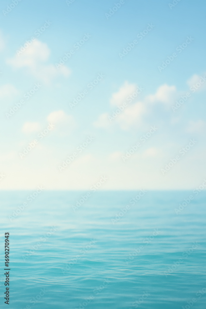 Obraz premium Calm ocean with blue sky and clouds