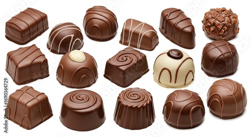 An assortment of fifteen assorted chocolates with varied shapes and decorations are displayed on a white background