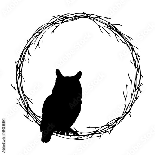 Tiempo de otoño. Logo con silueta de búho negro en corona circular de ramas de árbol para tarjetas y felicitaciones de Navidad