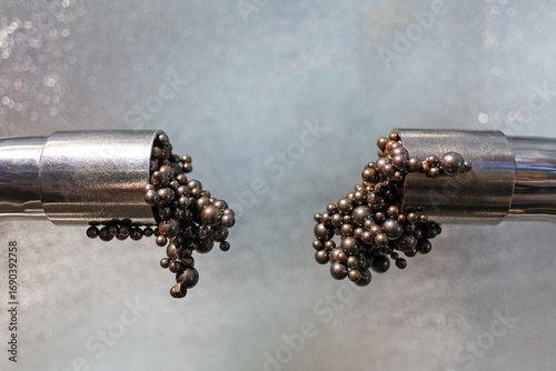 Ferromagnetic balls that are attracted to magnets.