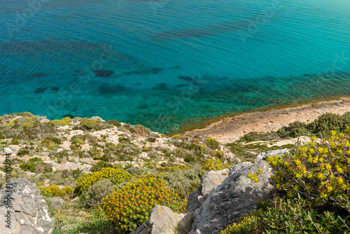 Greece, Elafonisos, Simos beach - 2 April 2024 - Bird's eye view of the crystal clear turquoise waters of Elafonisos Island