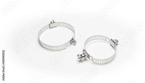 Stainless steel hose clamps on white background   