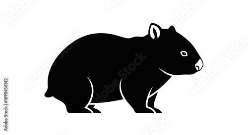 A simple black silhouette of a wombat standing on a white background.