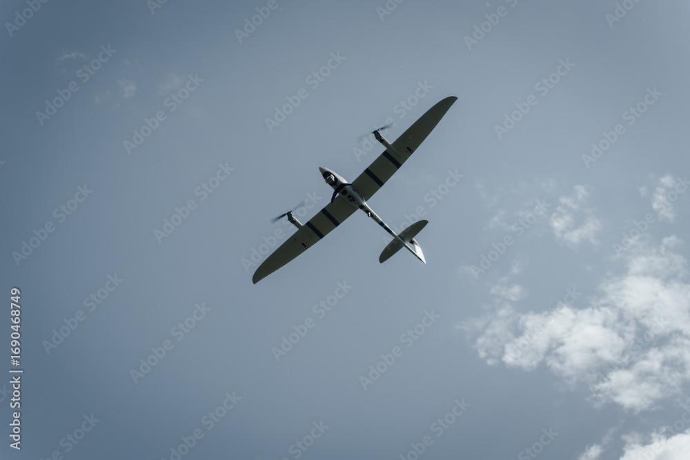 Fototapeta premium airplane in the sky, drones , war 