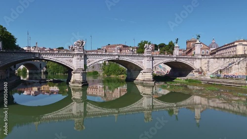 Aerial view of Rome showing the Tiber River winding through the city of ancient architecture. View of the city from above. Travelling through beautiful places of Rome. High quality footage in 4k forma